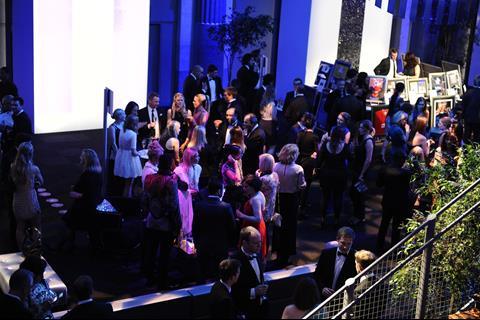 Guests enjoy the drinks reception at the PayPal Etail Awards 2013